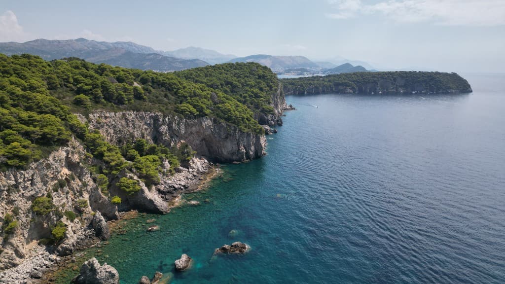 Forest-covered cliffs along the Adriatic coast near Dubrovnik