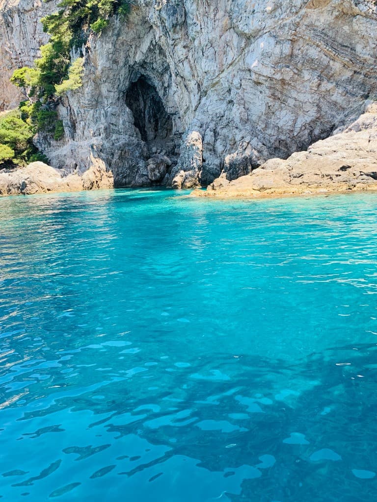 Sea cave entrance along the rocky Adriatic coastline near Dubrovnik